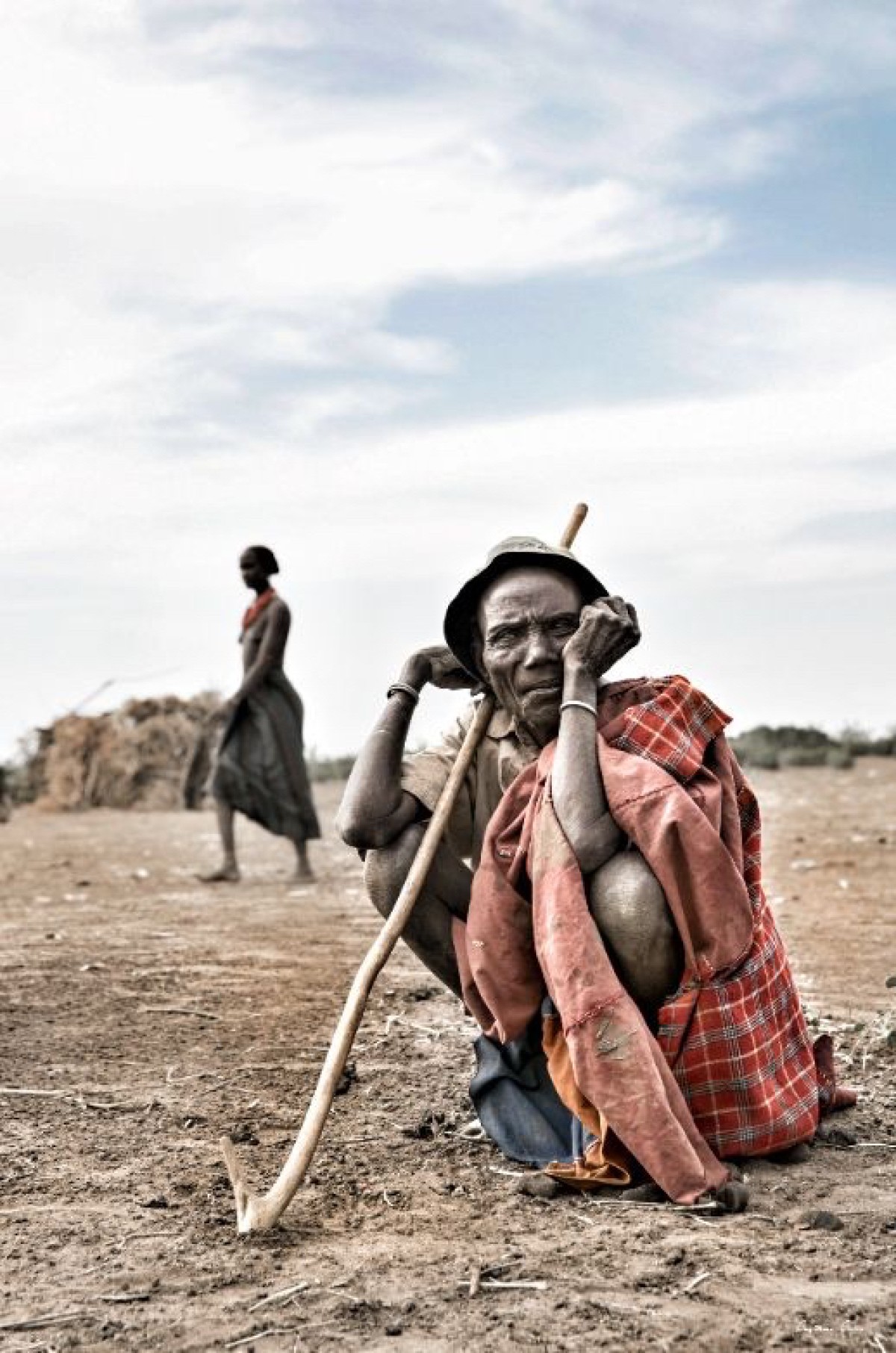 Old man and his bone cane.