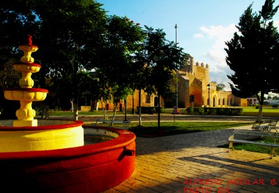 Fuente y convento.